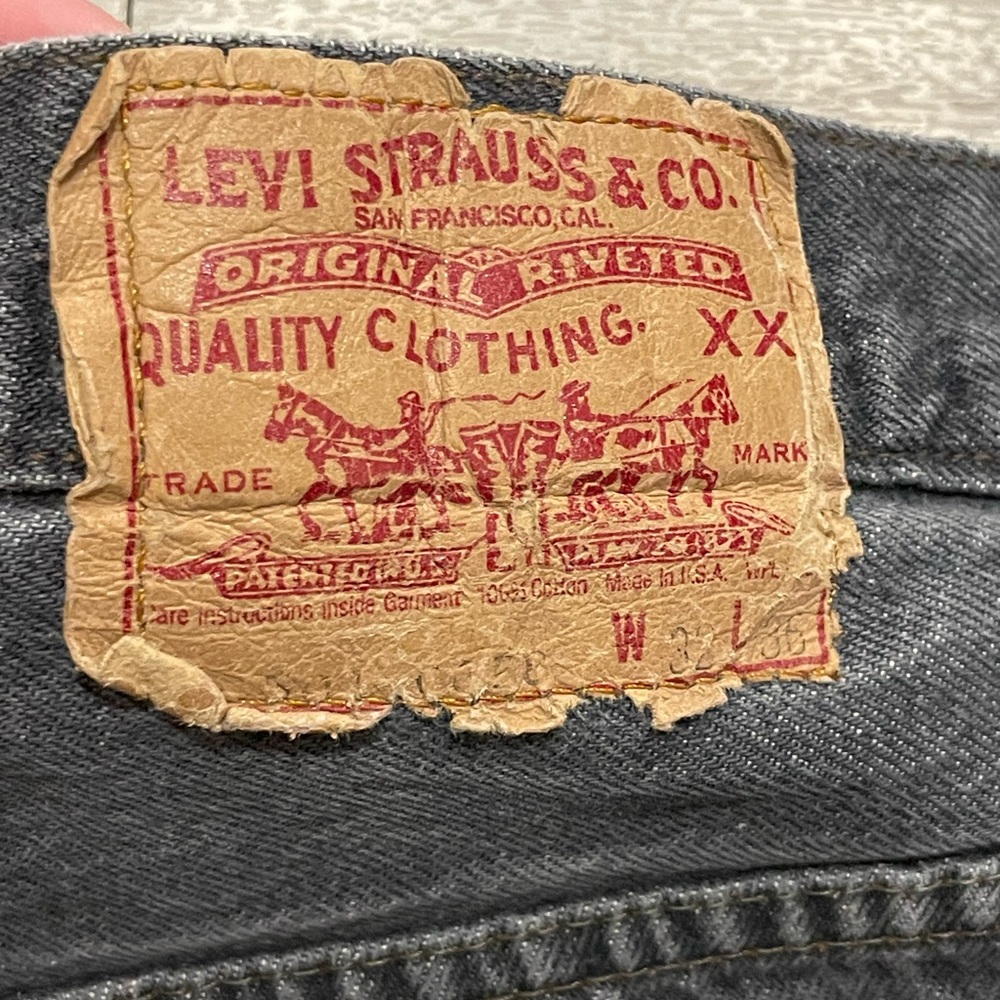 Vintage Levi’s 501 70s button fly faded black black jeans made in USA